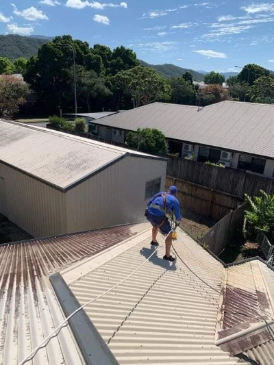 Expert team from Lexington Pressure Washing KY carrying out professional roof cleaning service.